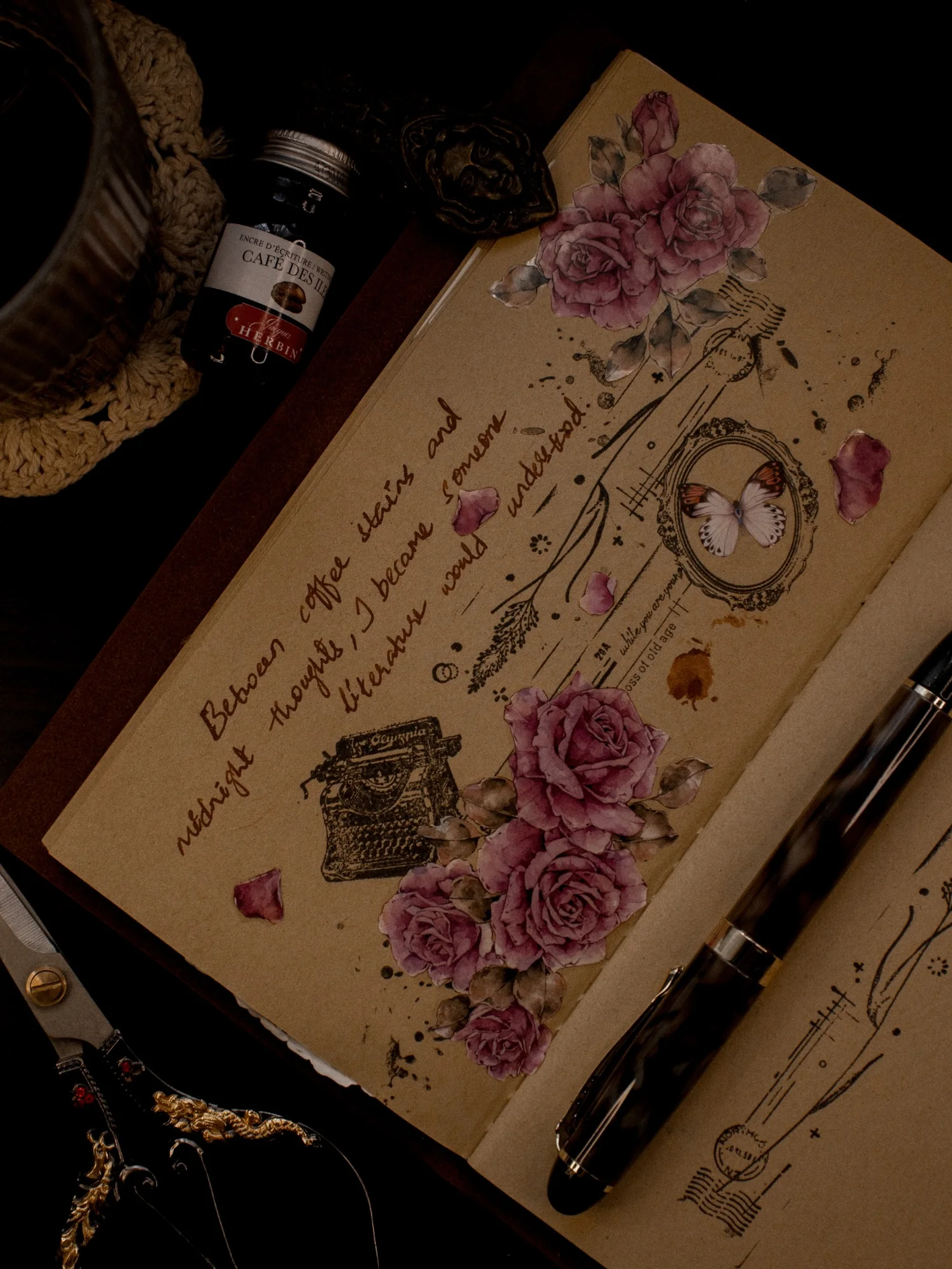 A close view of a journal page decorated with a pink rose, handwriting, and a small clock motif