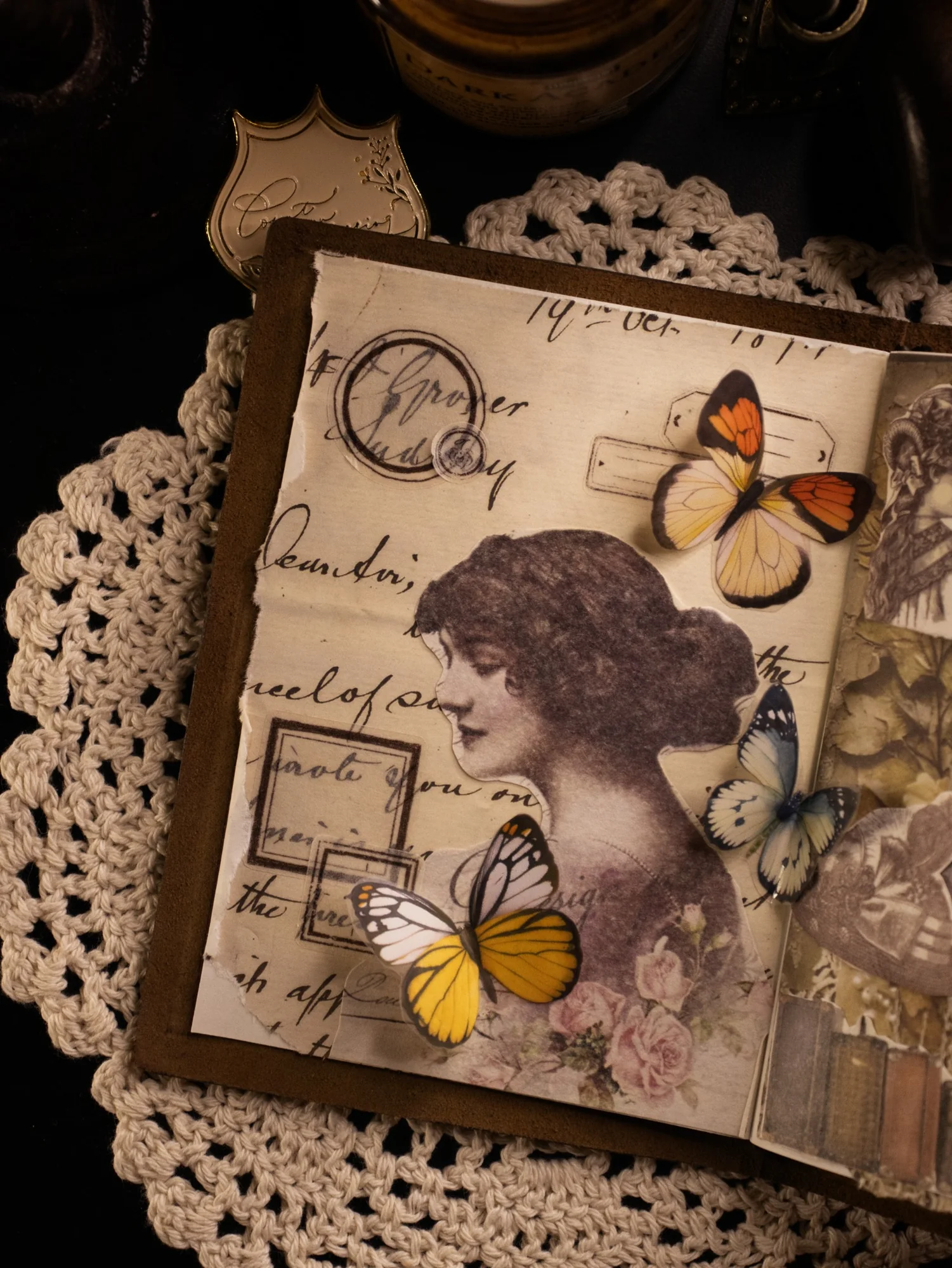 A vintage-style journal page with a sepia portrait, butterflies, and lace