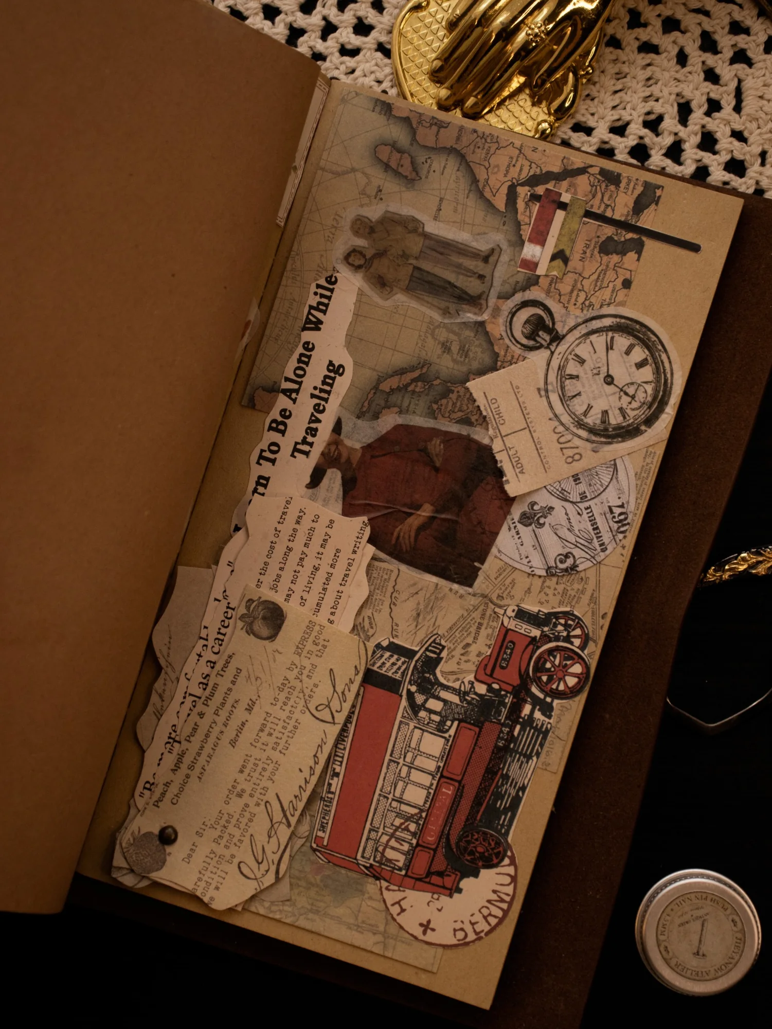 A journal page with a torn newspaper clipping, faded labels, and pressed botanical stems